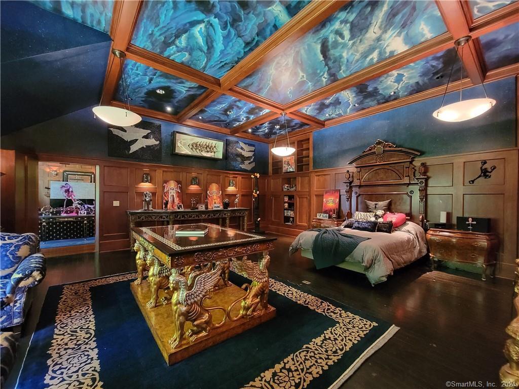 22 Ketcham Road Ridgefield, CT 06877 - Photo 21 of 40 a living room with furniture and a flat screen tv