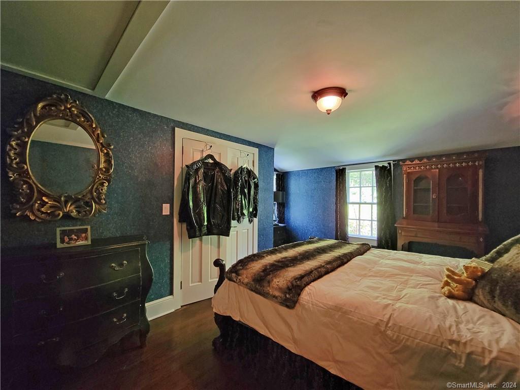 22 Ketcham Road Ridgefield, CT 06877 - Photo 26 of 40 a bedroom with a bed and a dresser