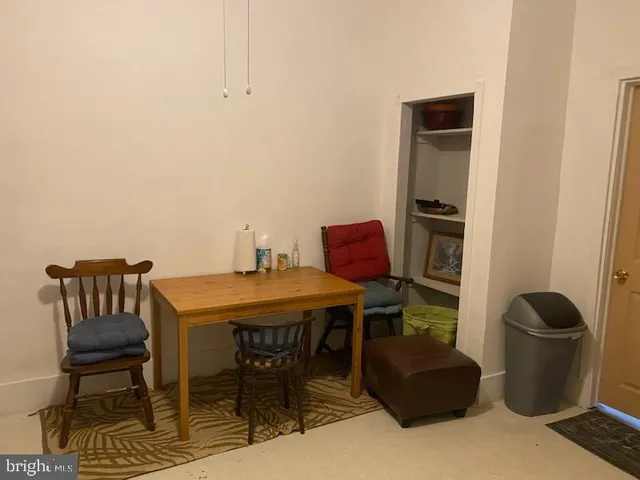 a bedroom with a bed and furniture