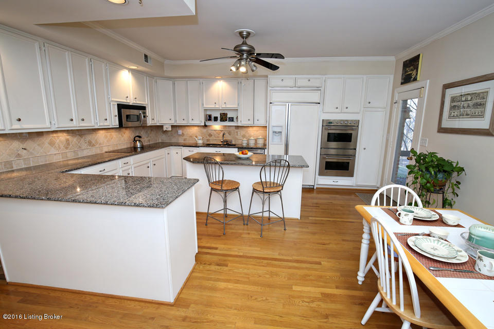1005 Devon Road Goshen, KY 40026 - Photo 33 of 55 Large kitchen features a large eat-in area with direct access to the screened porch. GE Monogram & Profile/Bosch appliances include built-in ovens & a wine cooler.