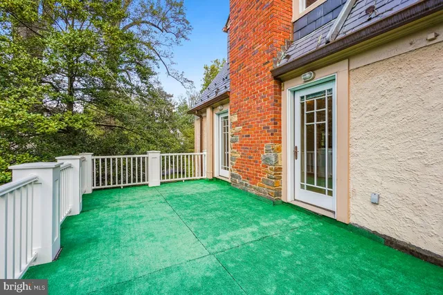 a bathroom with a shower and a bath tub