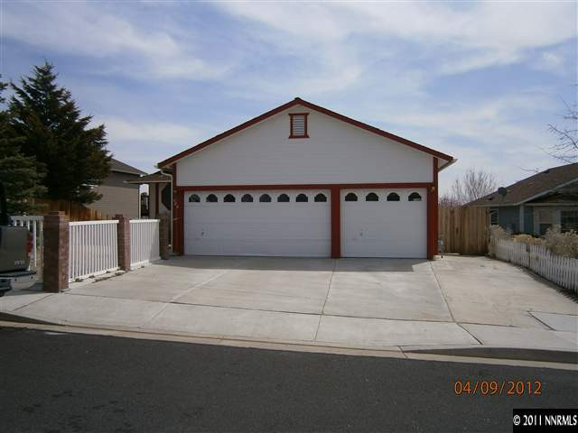 722 Talus Way Reno, NV 89503 - Photo 1 of 1 a front view of a house with a yard