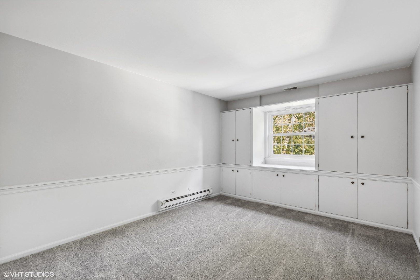 2425 Central Street, Unit 2B Evanston, IL 60201 - Photo 12 of 17 an empty room with windows