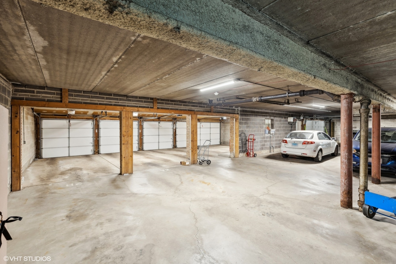 2425 Central Street, Unit 2B Evanston, IL 60201 - Photo 15 of 17 a view of parking garage with cars