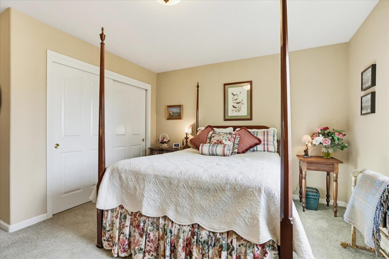 970 Morgan Ranch Drive Grass Valley, CA 95945 - Photo 32 of 76 a bedroom with a bed and a dresser