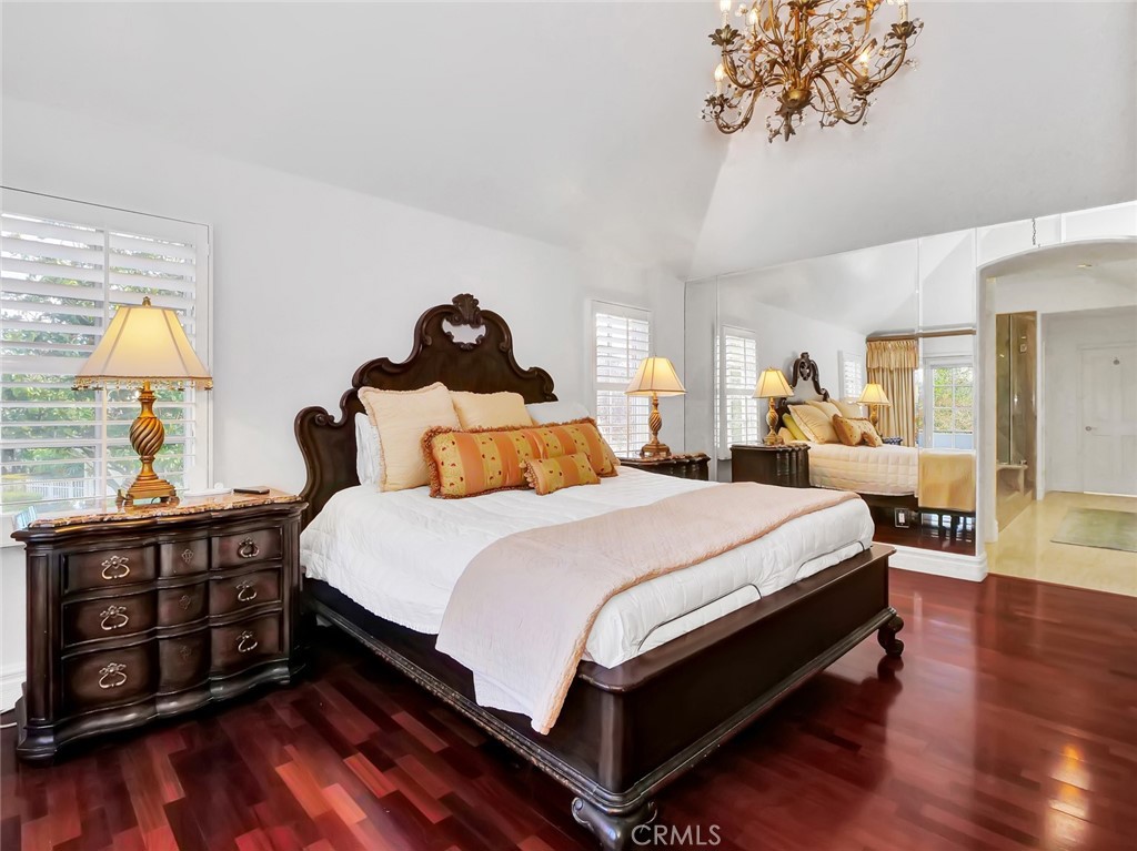7 Hillcrest Meadows Rolling Hills Estates, CA 90274 - Photo 20 of 49 a bedroom with bed and wooden floor