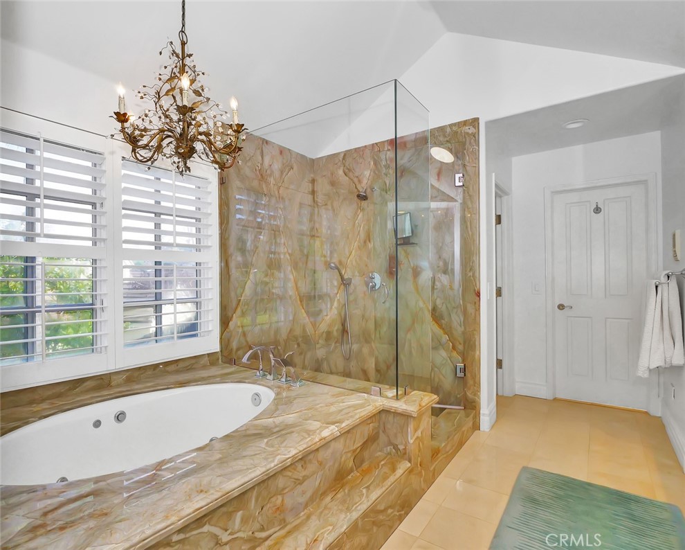 7 Hillcrest Meadows Rolling Hills Estates, CA 90274 - Photo 24 of 49 a spacious bathroom with a tub and shower