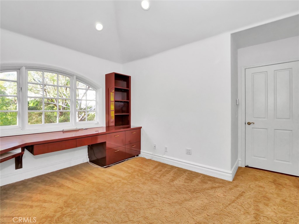 7 Hillcrest Meadows Rolling Hills Estates, CA 90274 - Photo 31 of 49 a view of an empty room with a window
