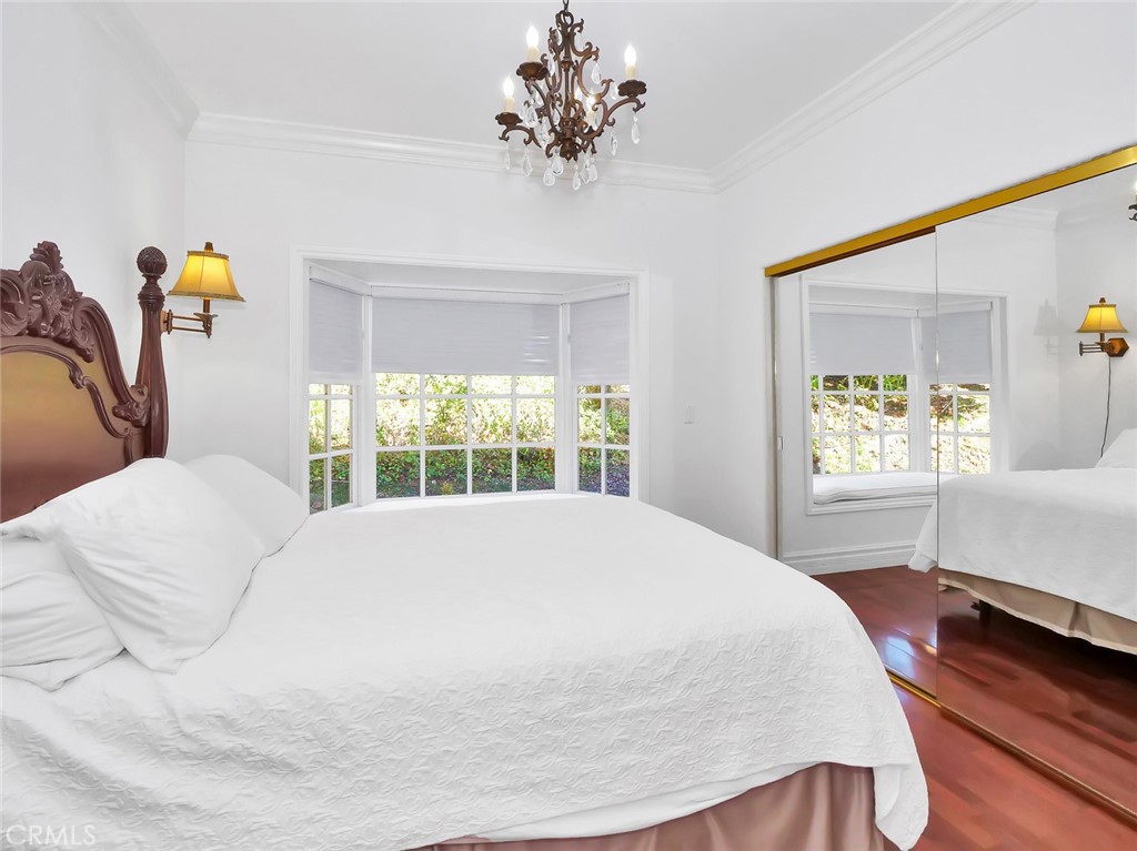 7 Hillcrest Meadows Rolling Hills Estates, CA 90274 - Photo 34 of 49 a bedroom with a bed and a window