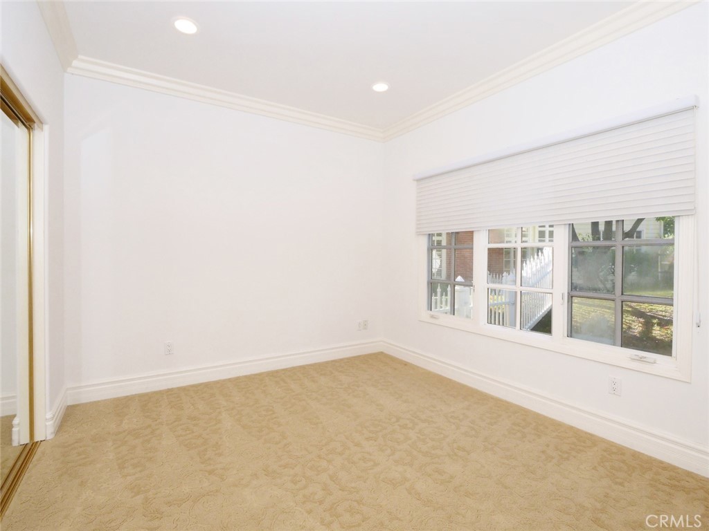 7 Hillcrest Meadows Rolling Hills Estates, CA 90274 - Photo 38 of 49 an empty room with a window