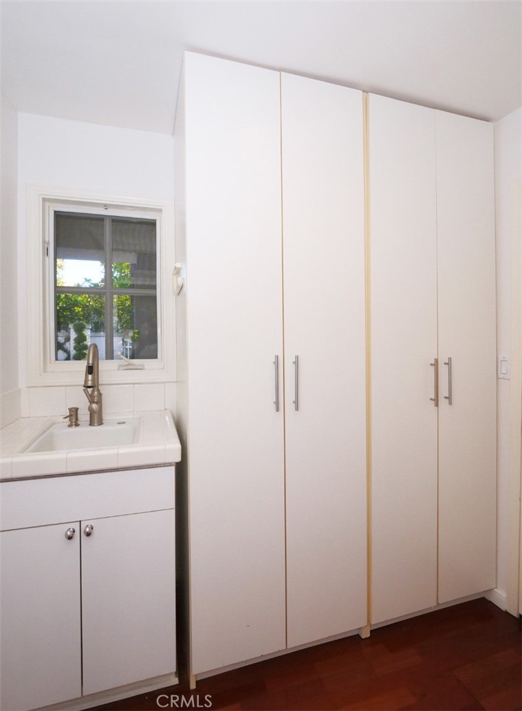 7 Hillcrest Meadows Rolling Hills Estates, CA 90274 - Photo 40 of 49 a bathroom with a sink and a mirror