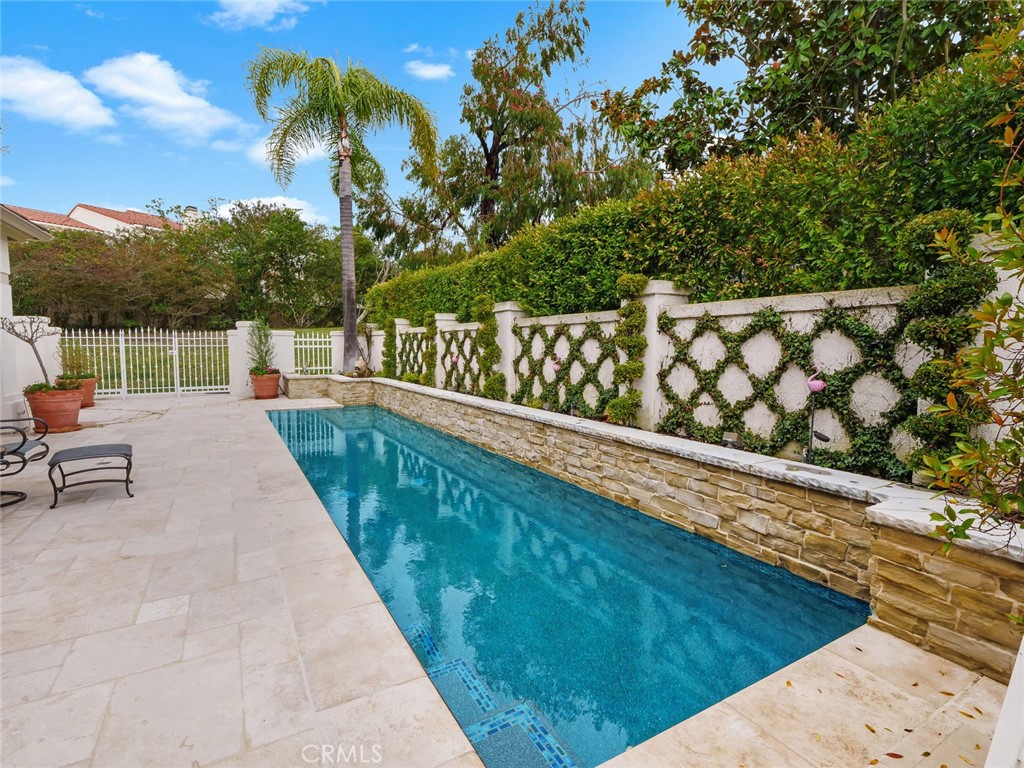 7 Hillcrest Meadows Rolling Hills Estates, CA 90274 - Photo 46 of 49 a view of swimming pool with a patio