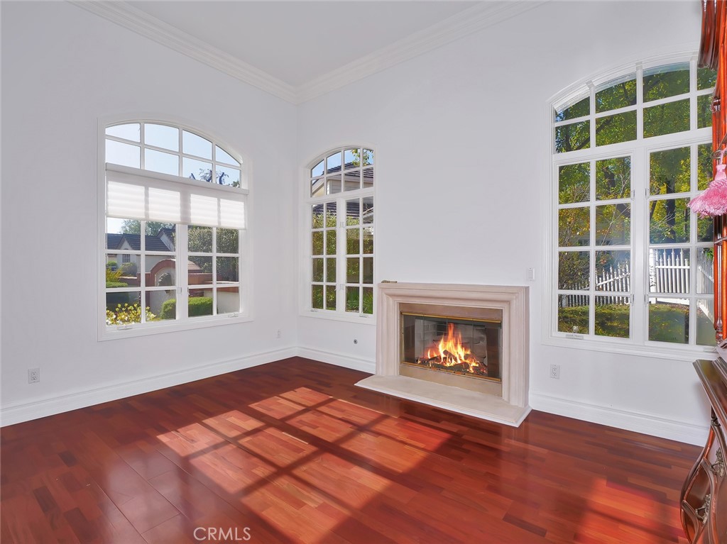 7 Hillcrest Meadows Rolling Hills Estates, CA 90274 - Photo 6 of 49 a view of an empty room with wooden floor and a window
