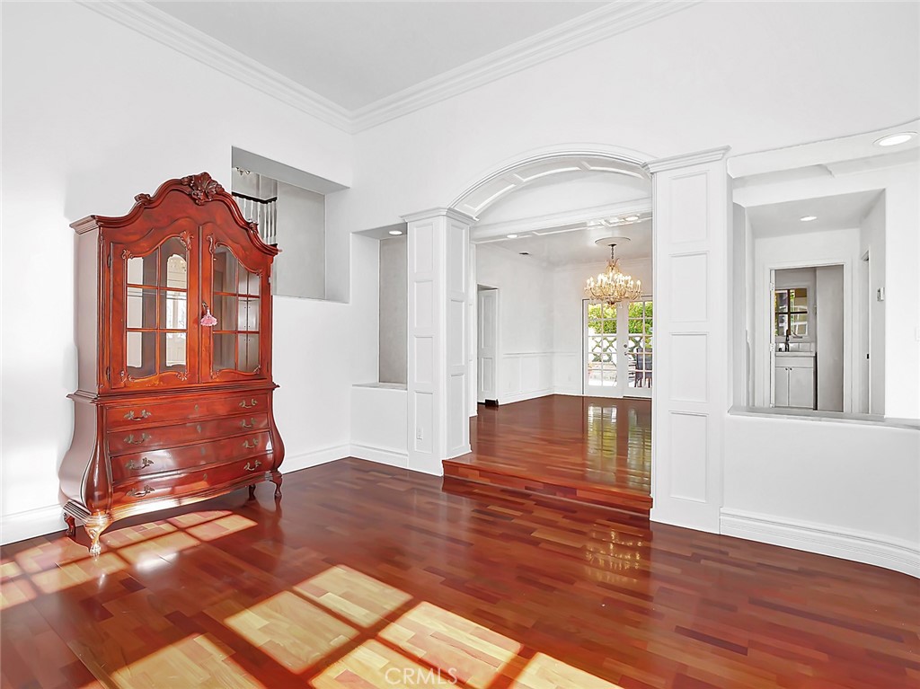 7 Hillcrest Meadows Rolling Hills Estates, CA 90274 - Photo 7 of 49 a living room with furniture and a wooden floor