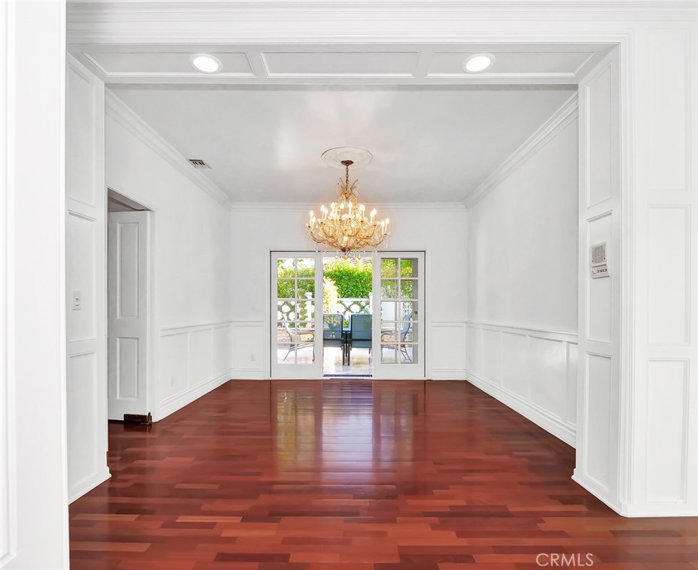7 Hillcrest Meadows Rolling Hills Estates, CA 90274 - Photo 8 of 49 a view of an empty room with wooden floor and a window
