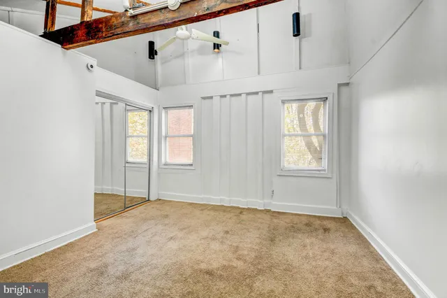 an empty room with windows