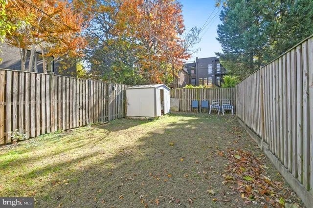 a view of a back yard of the house