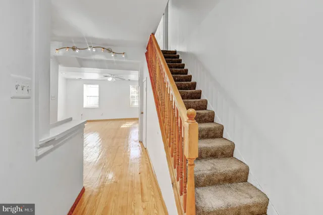 a view of a staircase and storage
