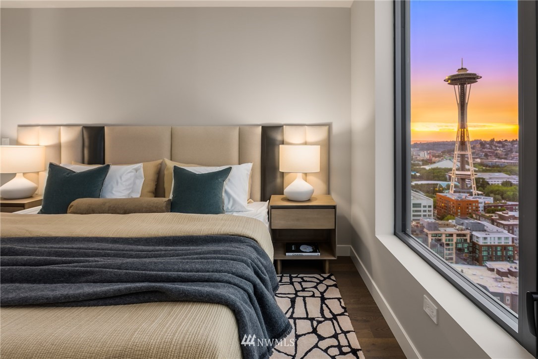 2510 6th Avenue, Unit 3502 Seattle, WA 98121 - Photo 5 of 38 a bedroom with a bed and a large window