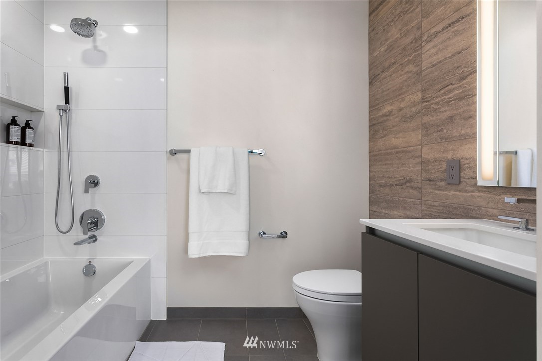 2510 6th Avenue, Unit 3502 Seattle, WA 98121 - Photo 6 of 38 a bathroom with a sink a toilet and shower