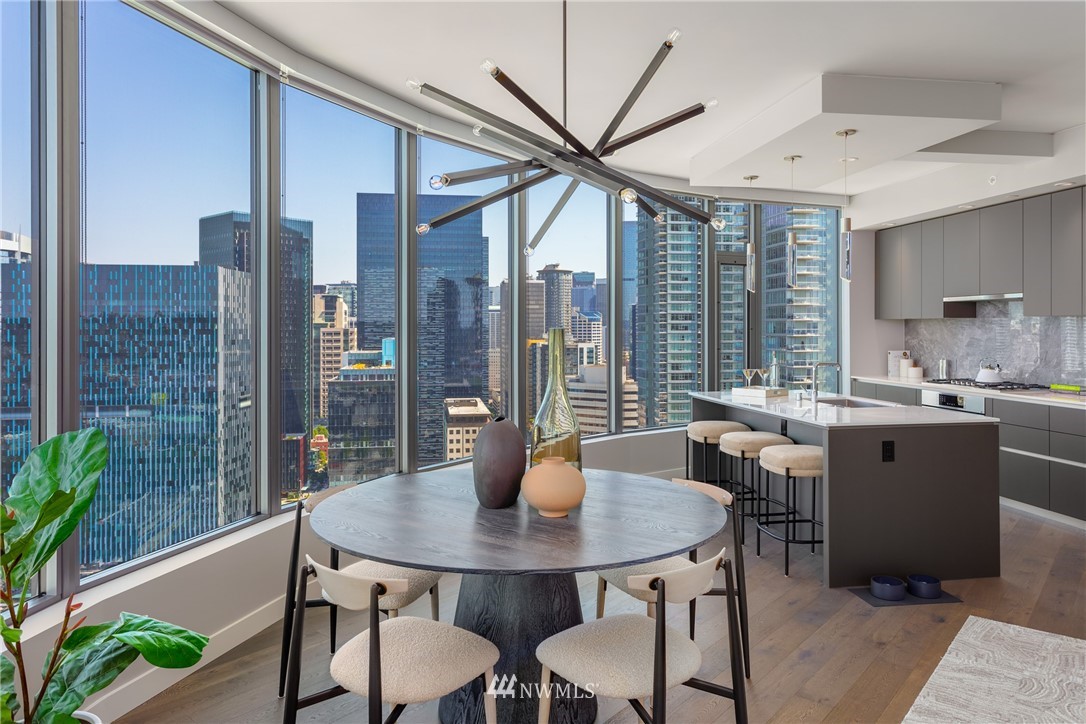 2510 6th Avenue, Unit 3502 Seattle, WA 98121 - Photo 8 of 38 a view of a dining room with furniture window and outside view