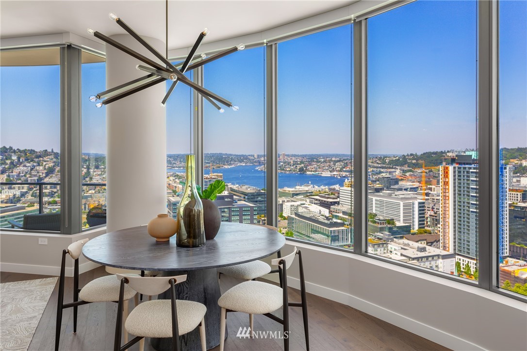 2510 6th Avenue, Unit 3502 Seattle, WA 98121 - Photo 9 of 38 a dining room with furniture and window