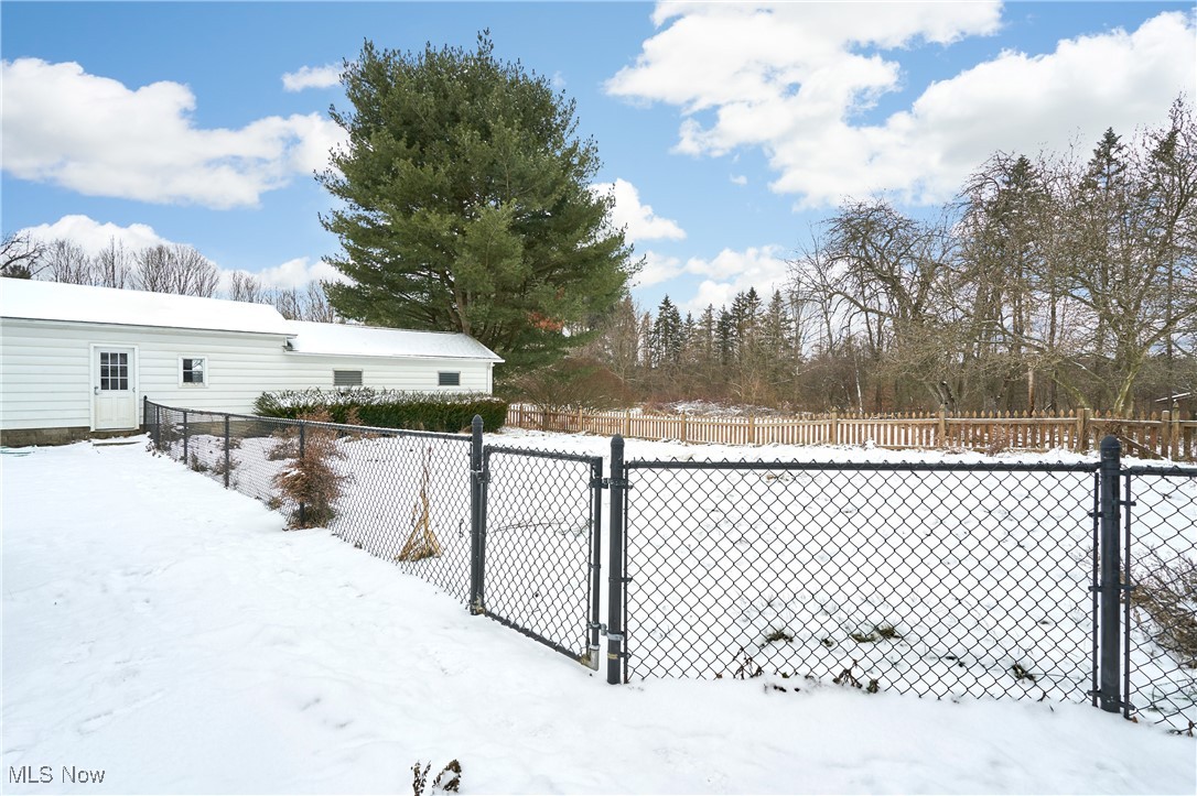 440 South Medina Line Road Akron, OH 44321 - Photo 22 of 27 Partially fenced yard