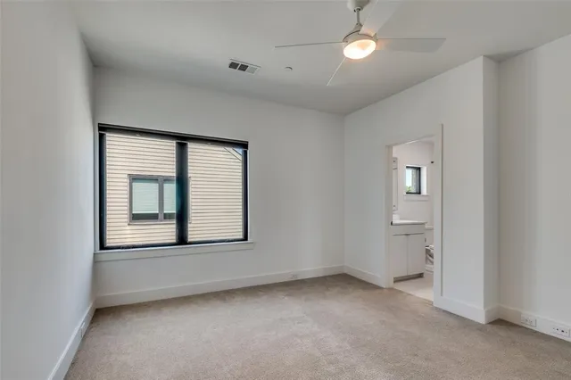 a view of an empty walk in closet