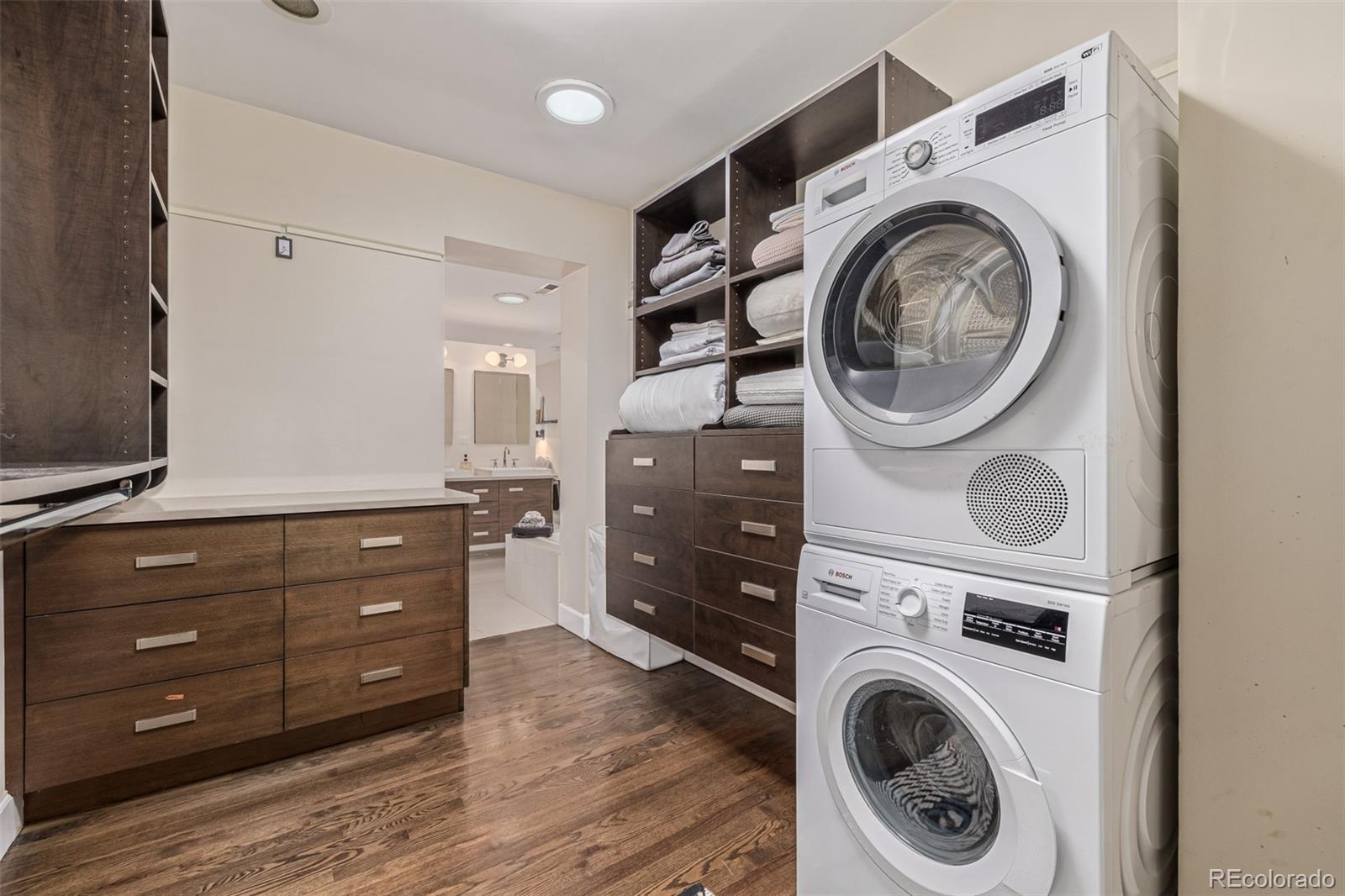 1227 Elm Street Denver, CO 80220 - Photo 34 of 44 a room with a washer and dryer