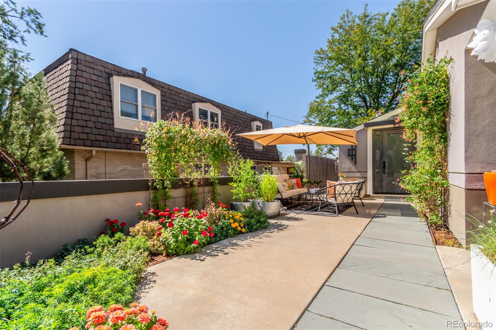 1227 Elm Street Denver, CO 80220 - Photo 35 of 44 front view of a house