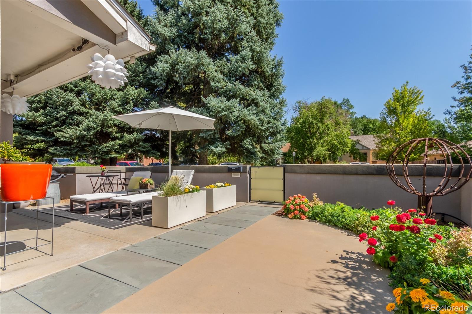 1227 Elm Street Denver, CO 80220 - Photo 44 of 44 a view of a swimming pool with a patio
