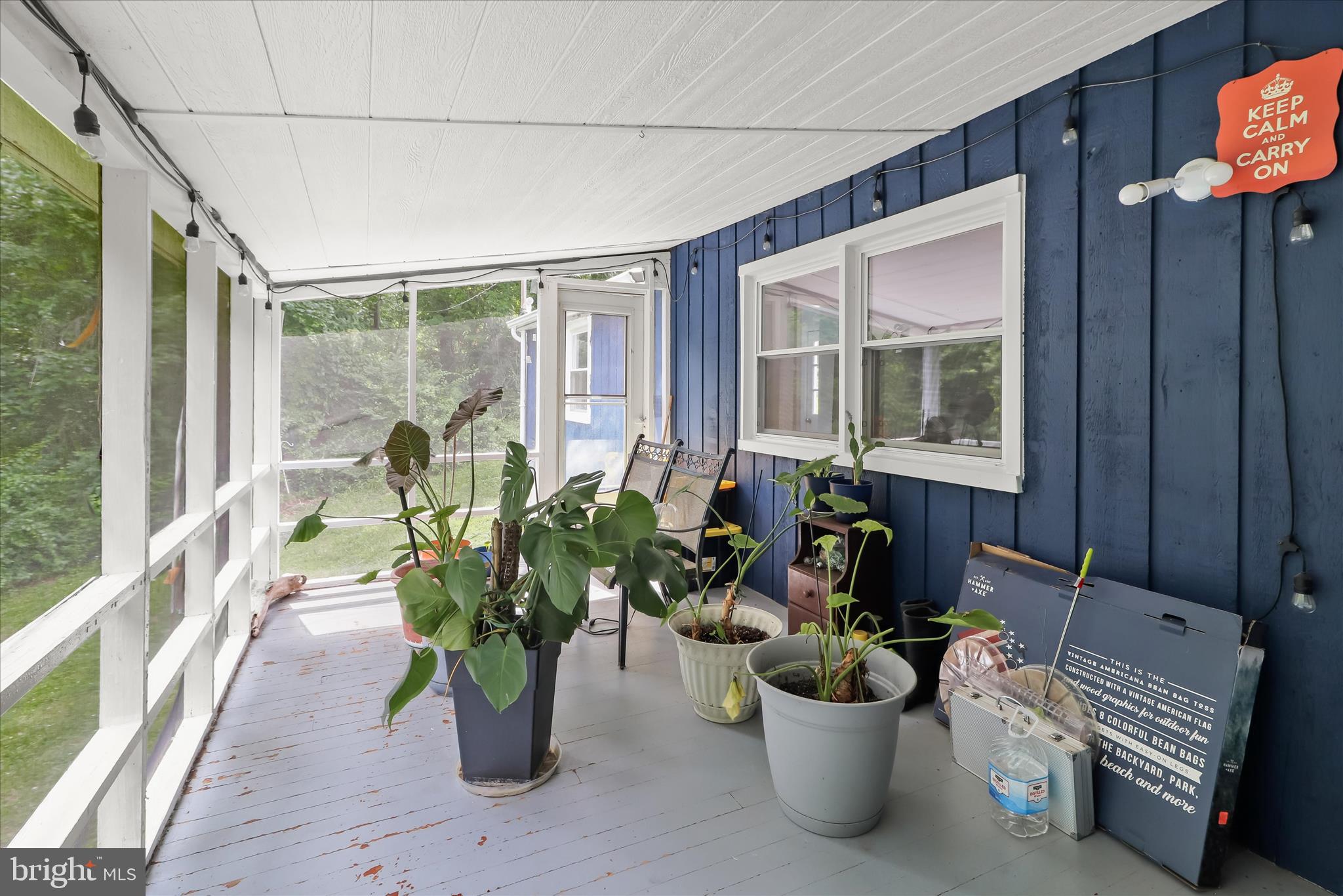 14213 Longnecker Road Reisterstown, MD 21136 - Photo 26 of 44 a building outdoor space with furniture and potted plants