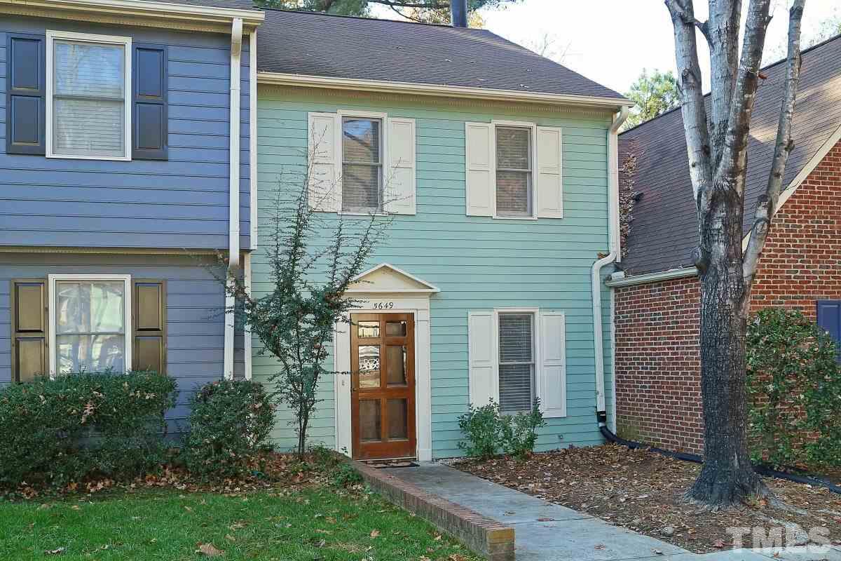 5649 Hamstead Crossing Raleigh, NC 27612 - Photo 1 of 25 a front view of a house with garden