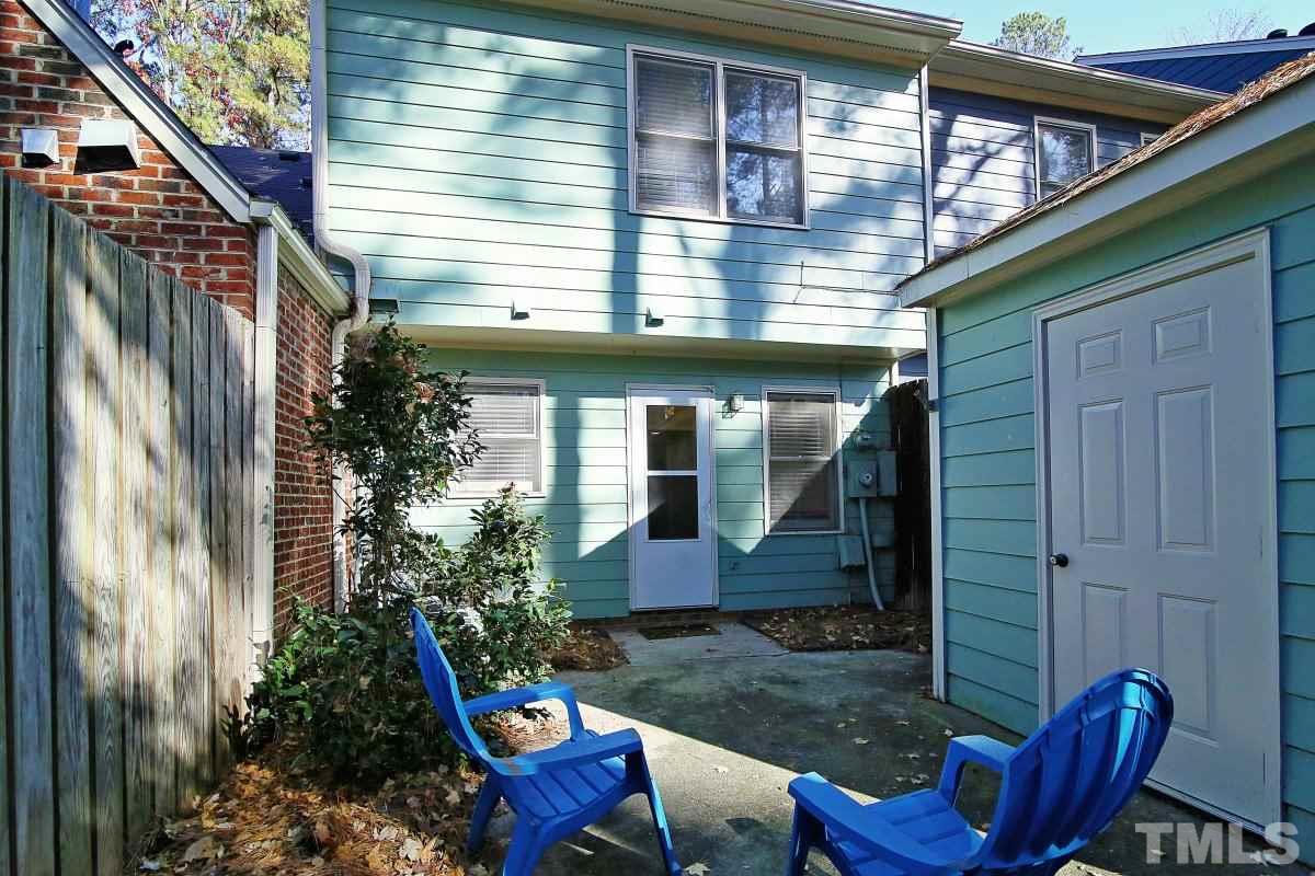 5649 Hamstead Crossing Raleigh, NC 27612 - Photo 20 of 25 a backyard of a house with outdoor seating