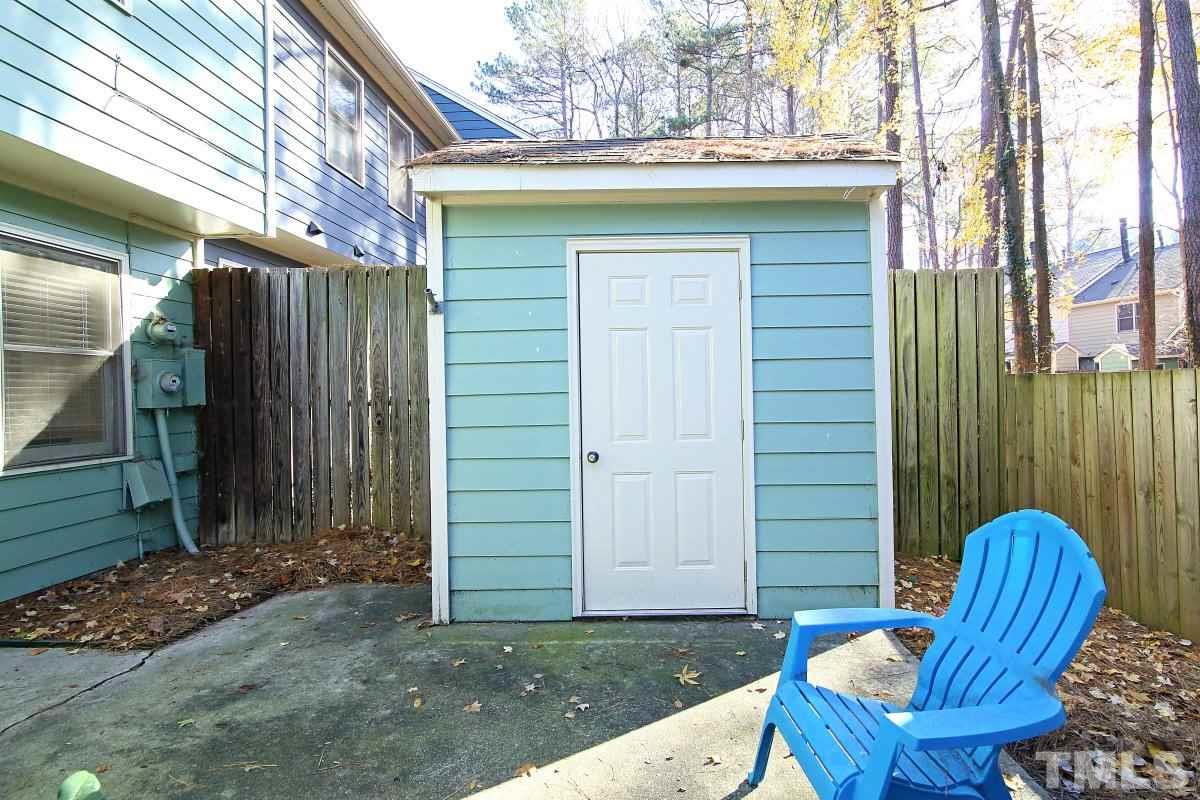 5649 Hamstead Crossing Raleigh, NC 27612 - Photo 21 of 25 a view of a chair in the patio