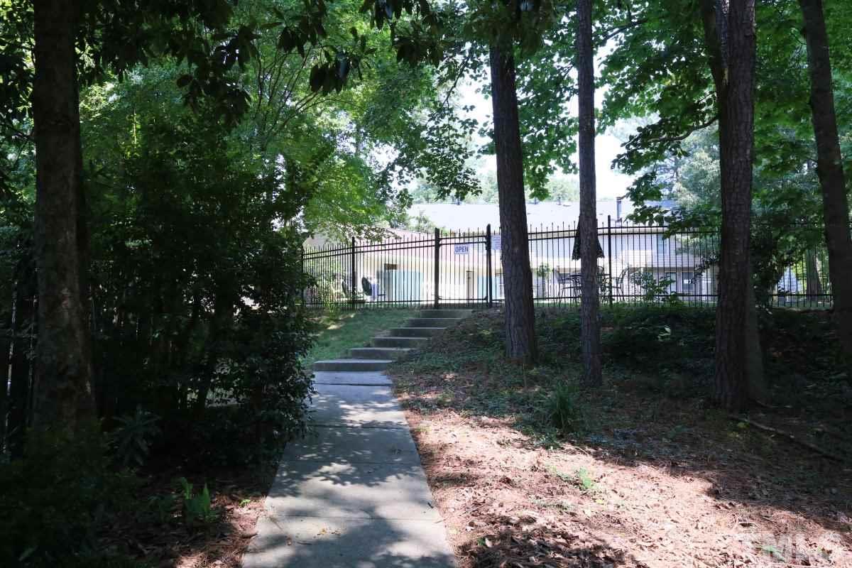 5649 Hamstead Crossing Raleigh, NC 27612 - Photo 22 of 25 a view of a back yard