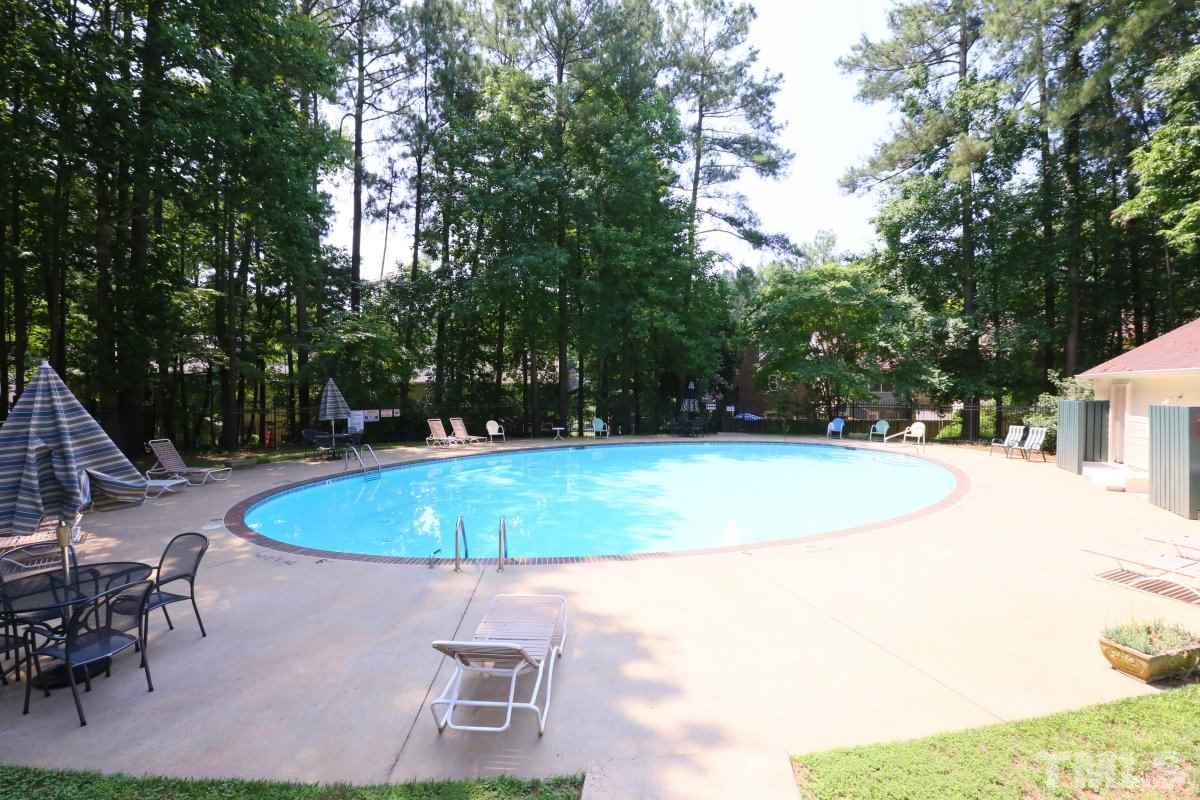 5649 Hamstead Crossing Raleigh, NC 27612 - Photo 23 of 25 a view of a swimming pool with a patio