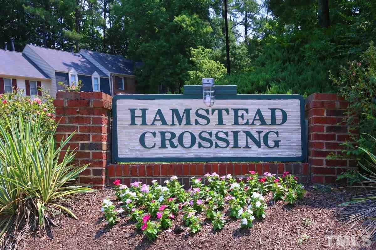 5649 Hamstead Crossing Raleigh, NC 27612 - Photo 25 of 25 a sign on the side of the building