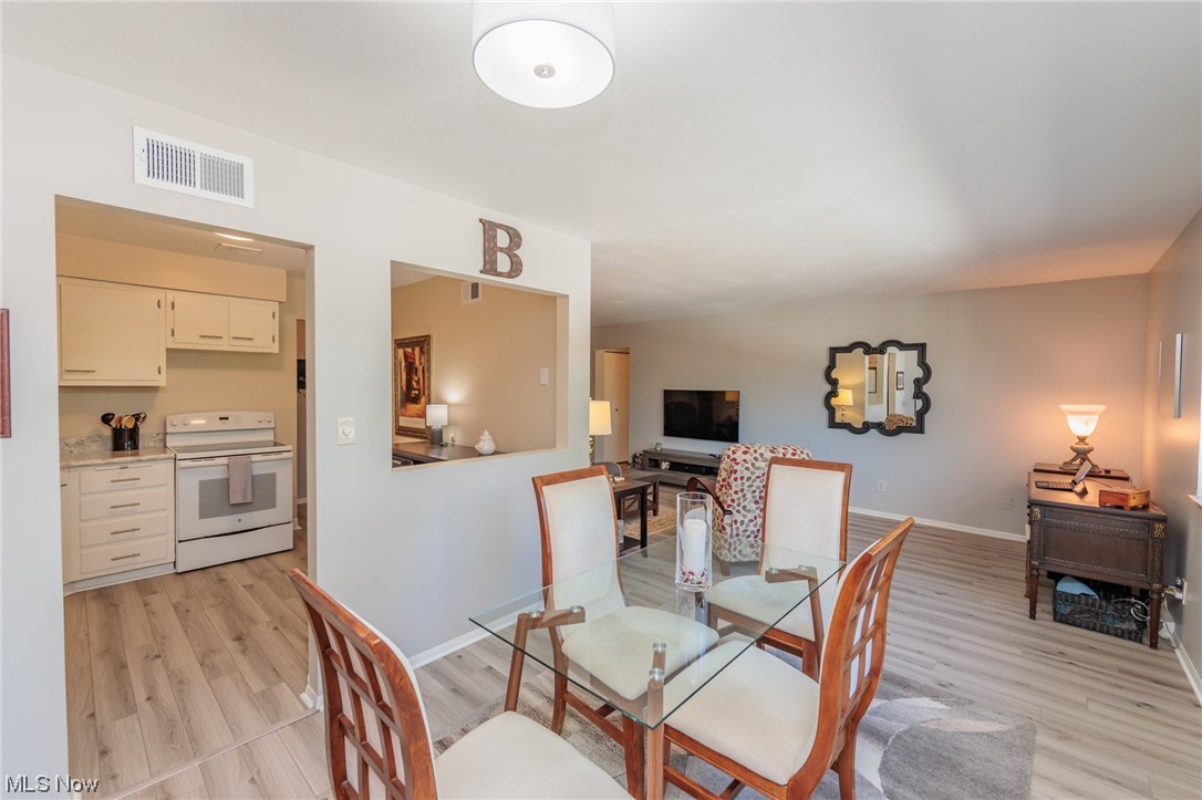 1750 Wagar Road, Unit 206 Rocky River, OH 44116 - Photo 11 of 33 dining room adjacent too kitchen