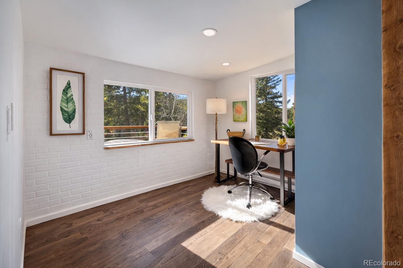 24 Signal Rock Road Golden, CO 80403 - Photo 15 of 26 a workspace with furniture and a window