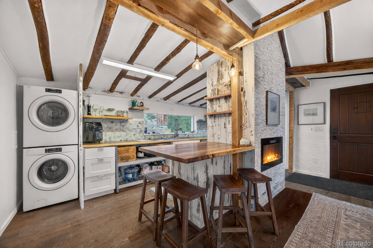 24 Signal Rock Road Golden, CO 80403 - Photo 8 of 26 a view of a room with washer and dryer