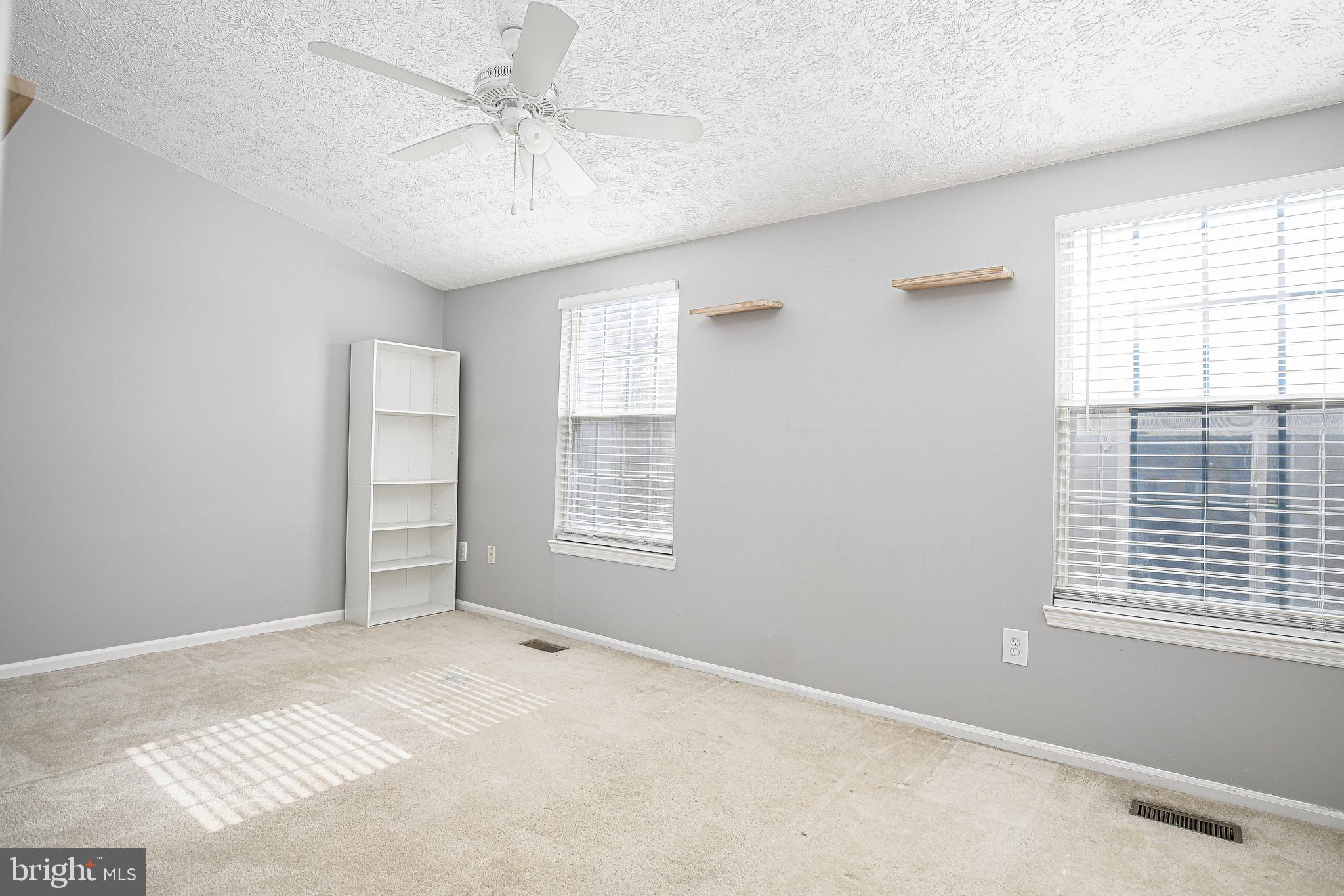 3702 Timahoe Circle Baltimore, MD 21236 - Photo 16 of 34 a view of an empty room with a window