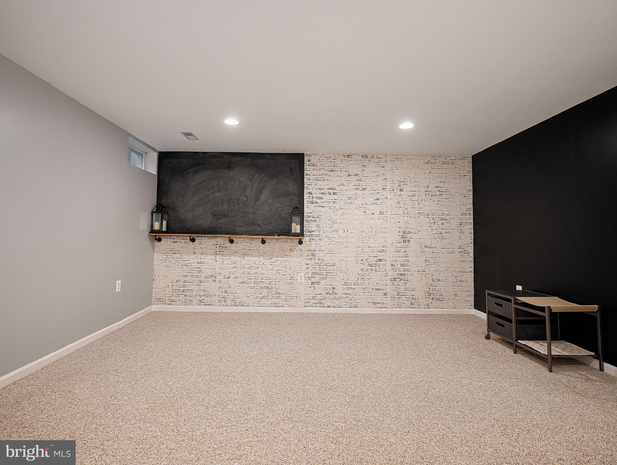 3702 Timahoe Circle Baltimore, MD 21236 - Photo 18 of 34 a view of workspace with a flat screen tv