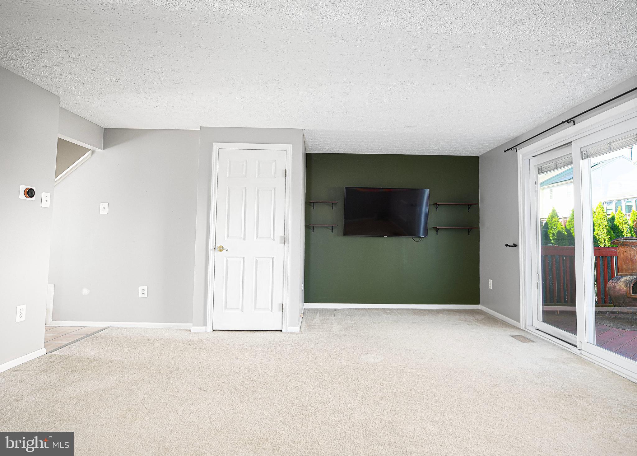 3702 Timahoe Circle Baltimore, MD 21236 - Photo 7 of 34 a view of an empty room with a window