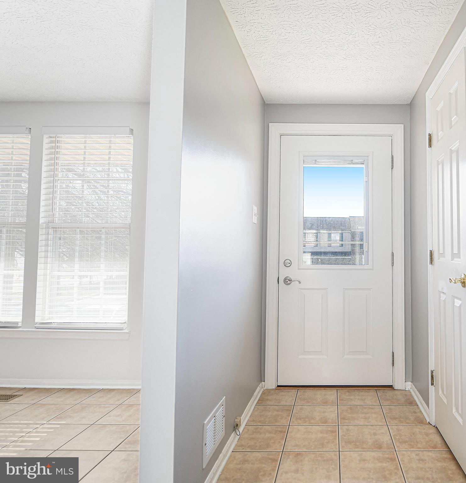 3702 Timahoe Circle Baltimore, MD 21236 - Photo 10 of 34 a view of an empty room with a window