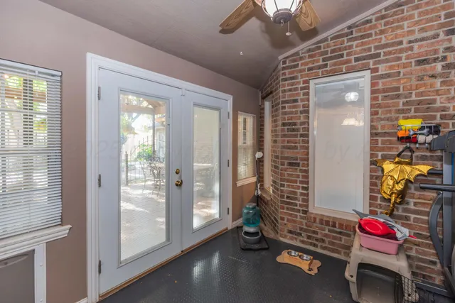 a kitchen with stainless steel appliances granite countertop a stove and a sink