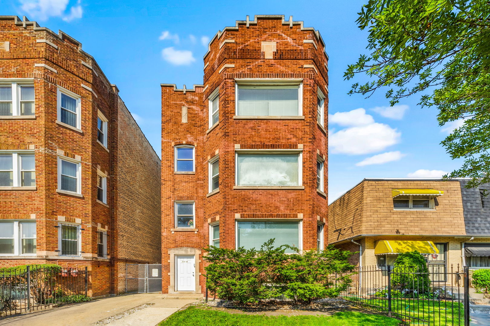 7416 South Yates Boulevard, Unit 2 Chicago, IL 60649 - Photo 1 of 16 front view of a building
