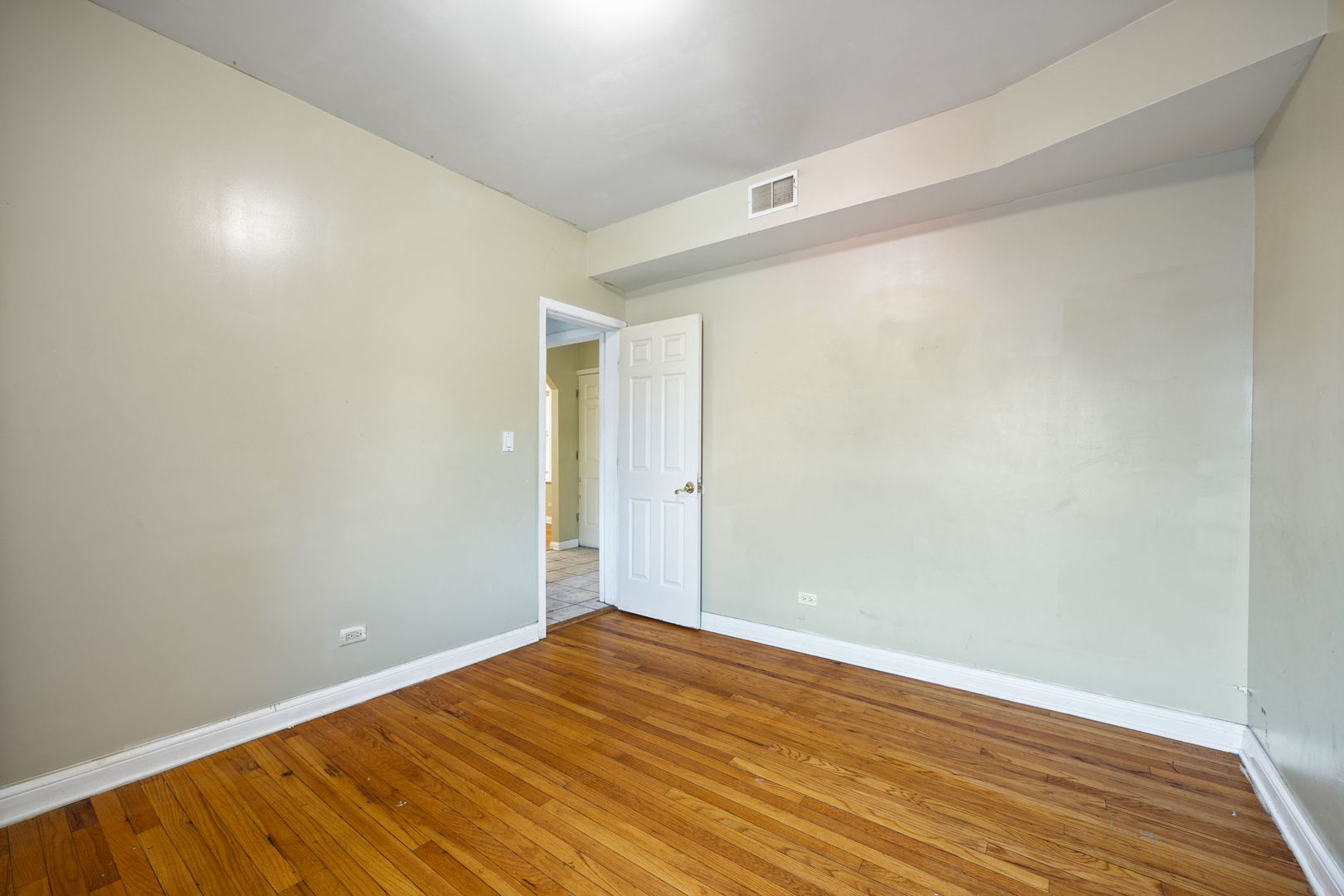 7416 South Yates Boulevard, Unit 2 Chicago, IL 60649 - Photo 14 of 16 a view of empty room