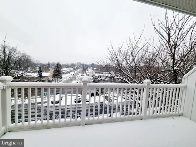 a view of a balcony with city view