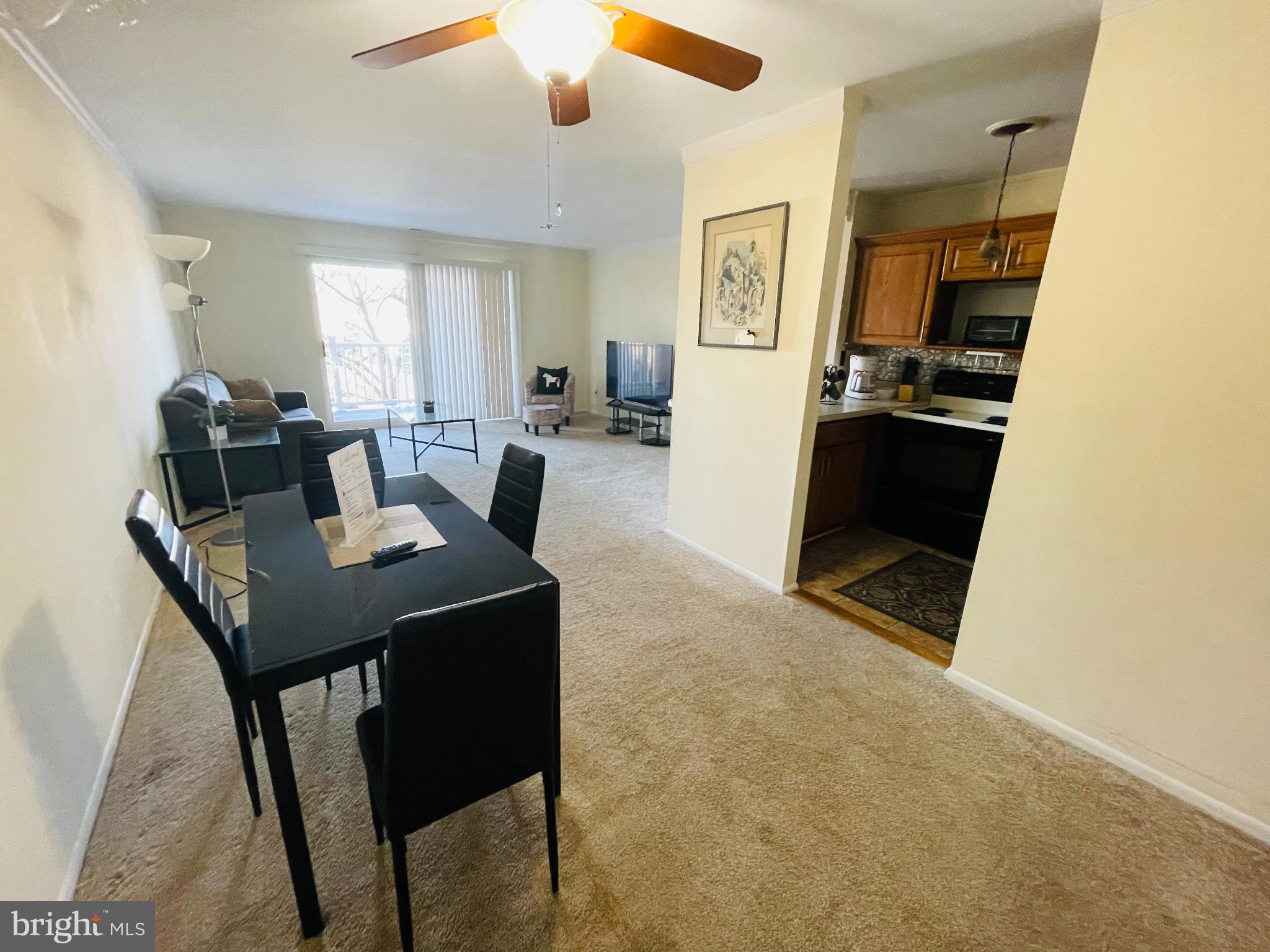 46 Township Line Road, Unit 215 Elkins Park, PA 19027 - Photo 7 of 17 a view of a dining room with furniture